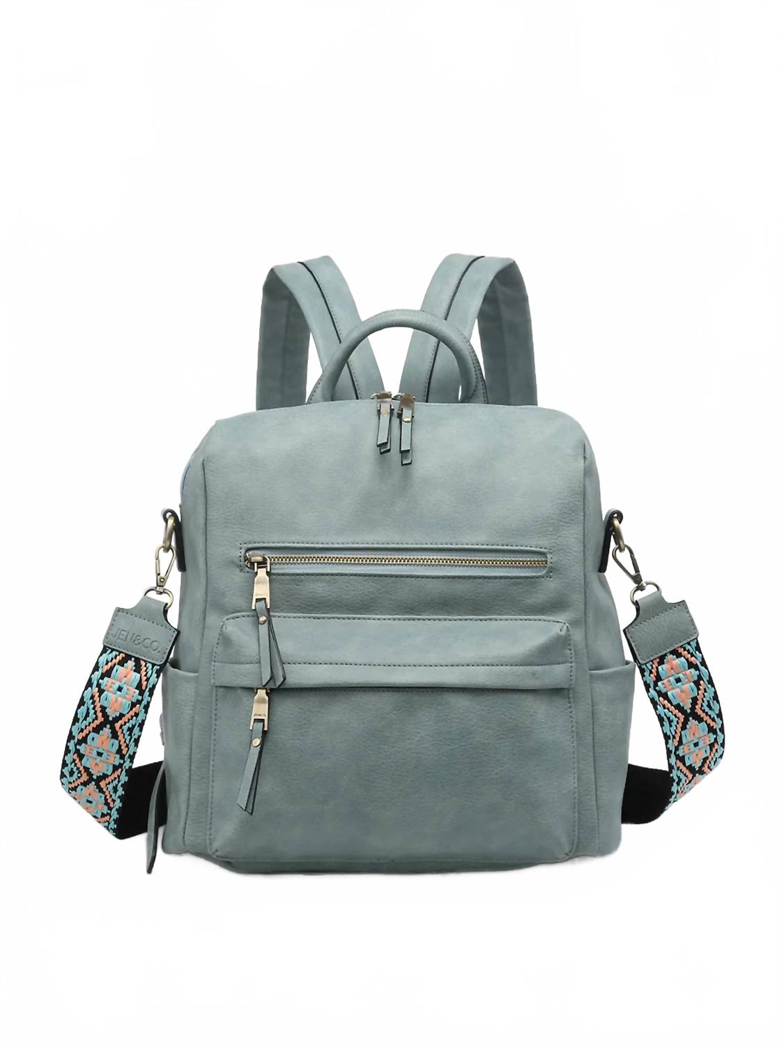 

Женский рюкзак Amelia с трансформируемой спинкой и гитарным ремнем в бирюзовом цвете Jen & Co.