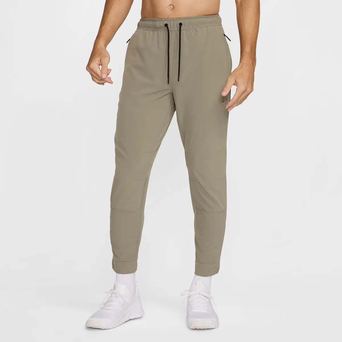 

Мужские брюки Nike Unlimited, зеленый