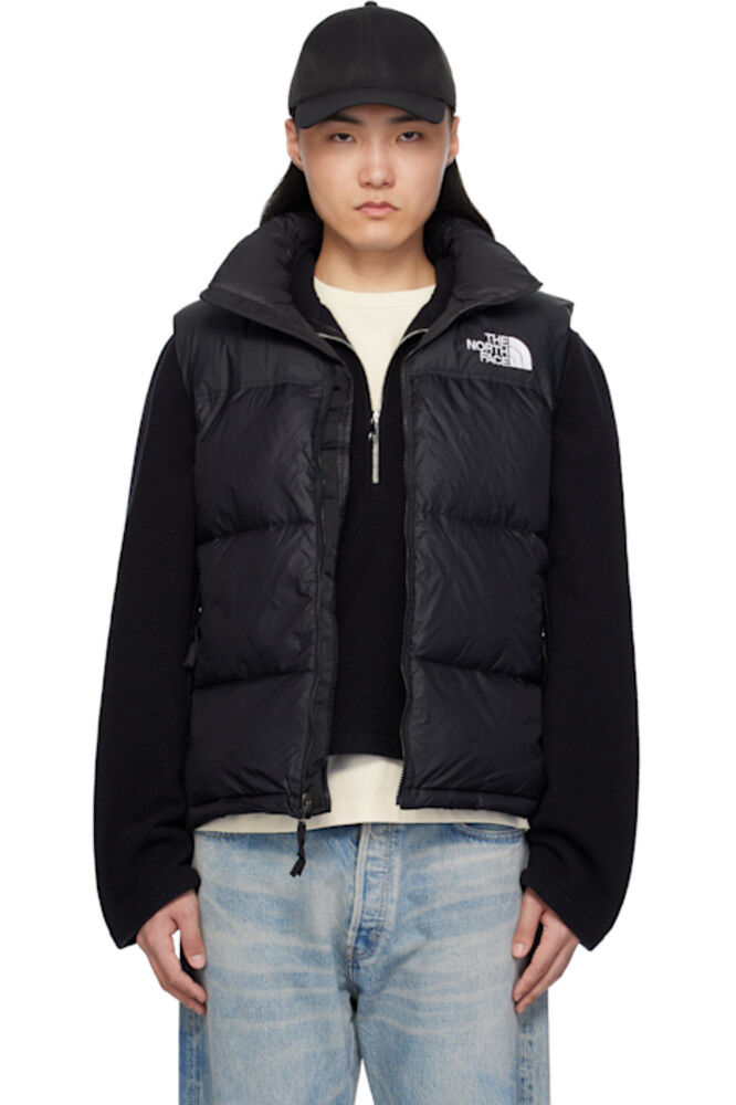 

Черный пуховый жилет Nuptse 1996 года в стиле ретро The North Face