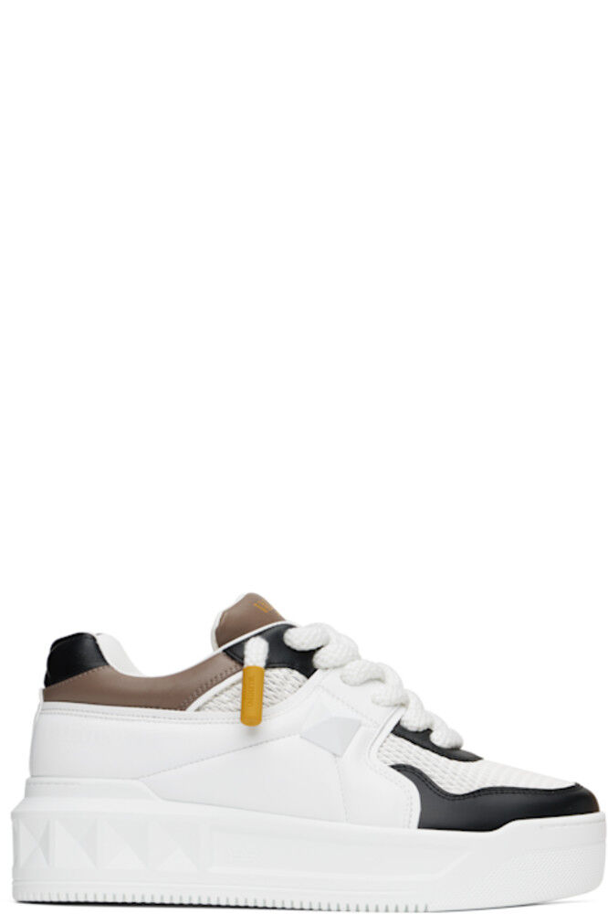 

Белые и черные низкие кроссовки One Stud XL Valentino Garavani