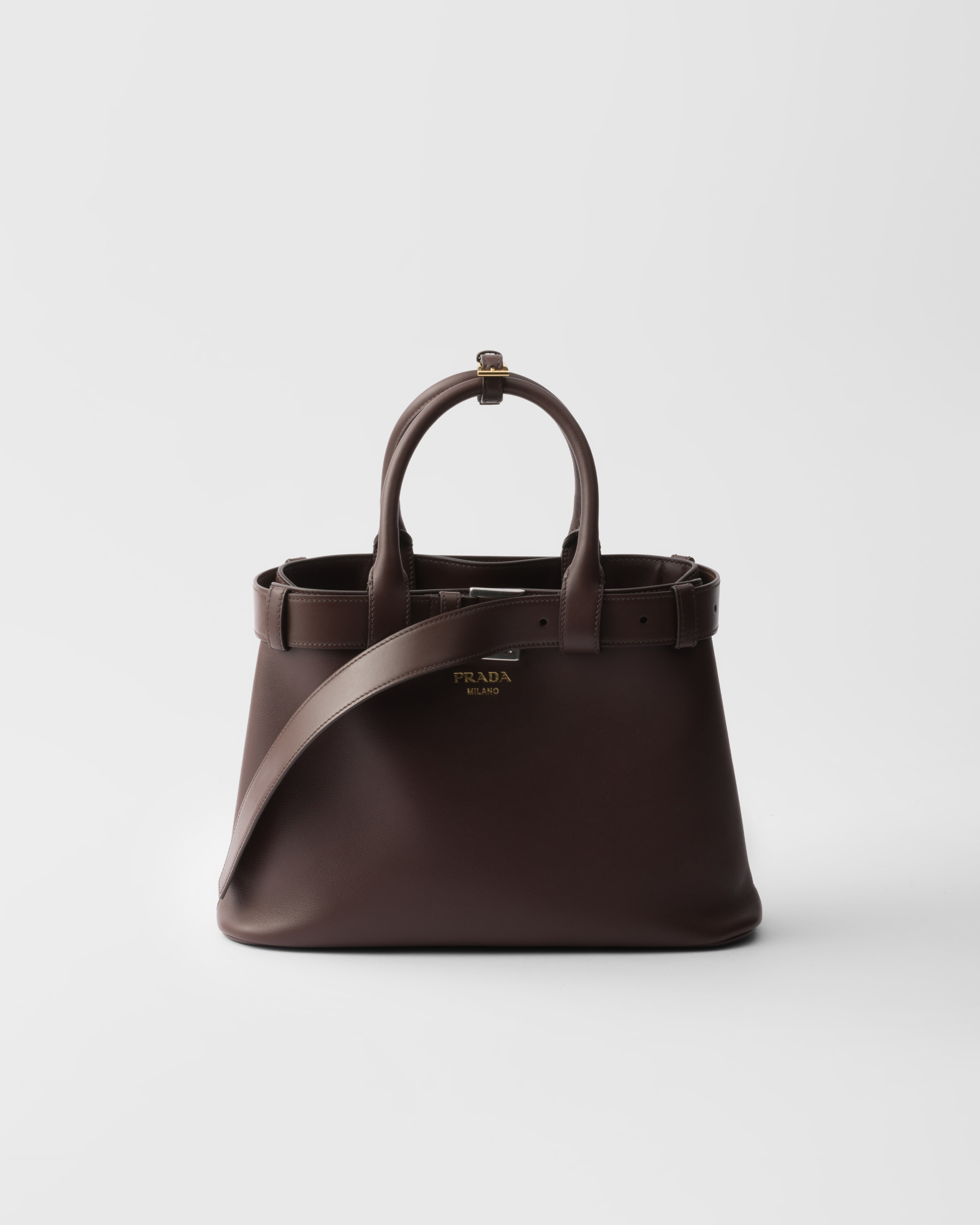 

Небольшая кожаная сумка Prada Buckle с ремнем, коричневый