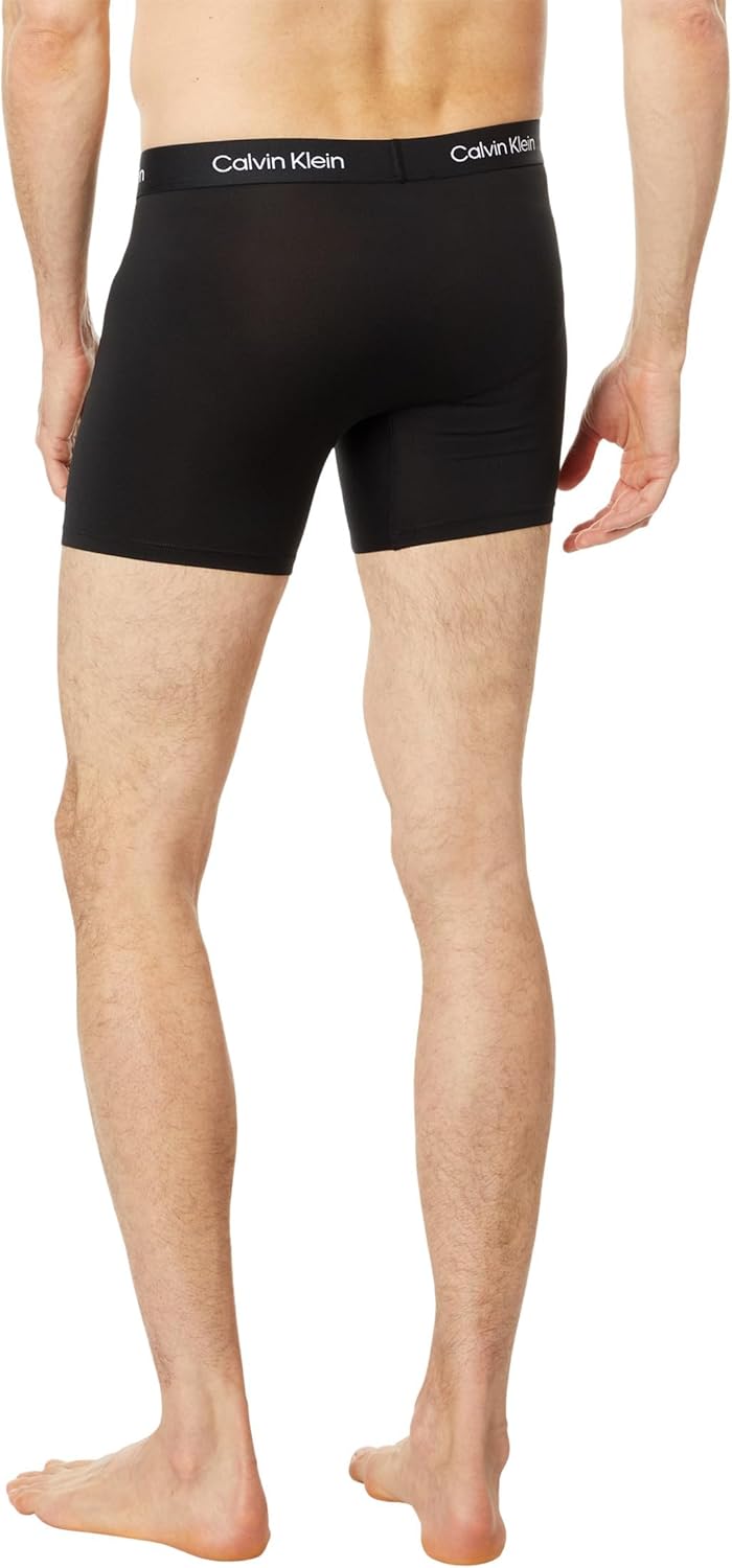 

Мужские микробоксеры Calvin Klein 1996 года, Black/Neon Hearts Graphic/Poppy Red