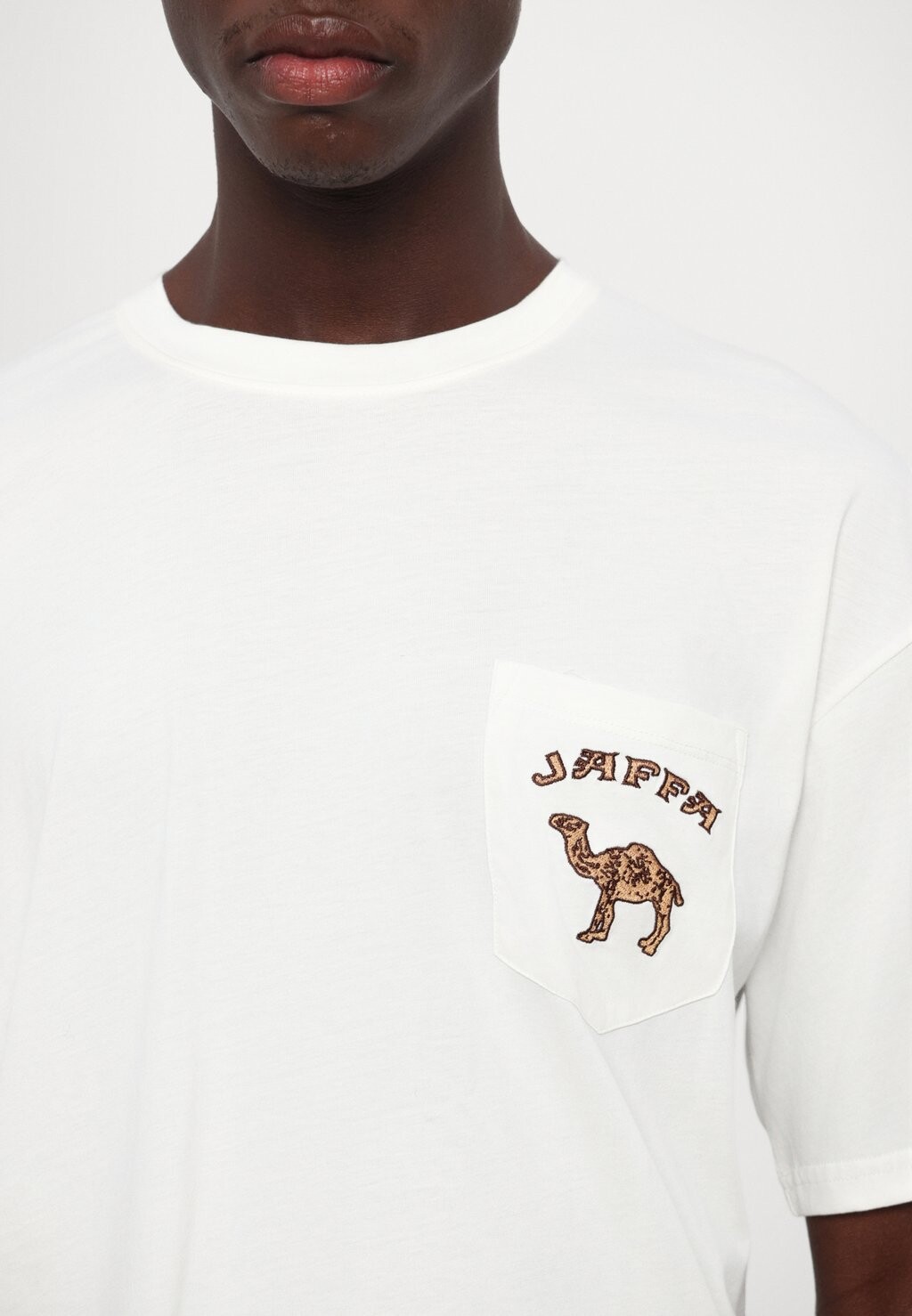 

Футболка с принтом POCKETED UNISEX HOUSE OF JAFFA, молочный