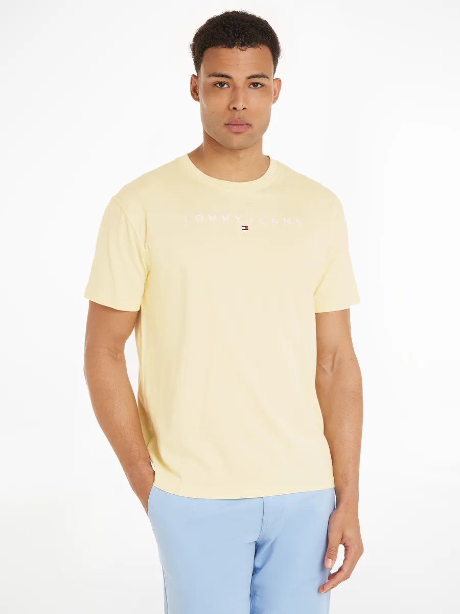 

Футболка Tommy Jeans "TJM REG LINEAR LOGO TEE EXT" с фирменной этикеткой, цвет Lemon Zest