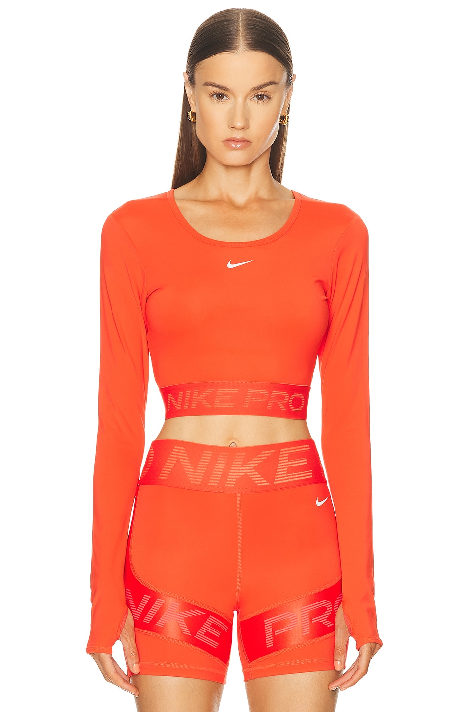 

Облегающий укороченный топ с длинными рукавами Dri-FIT Nike, Light Crimson, Ember Glow, & White