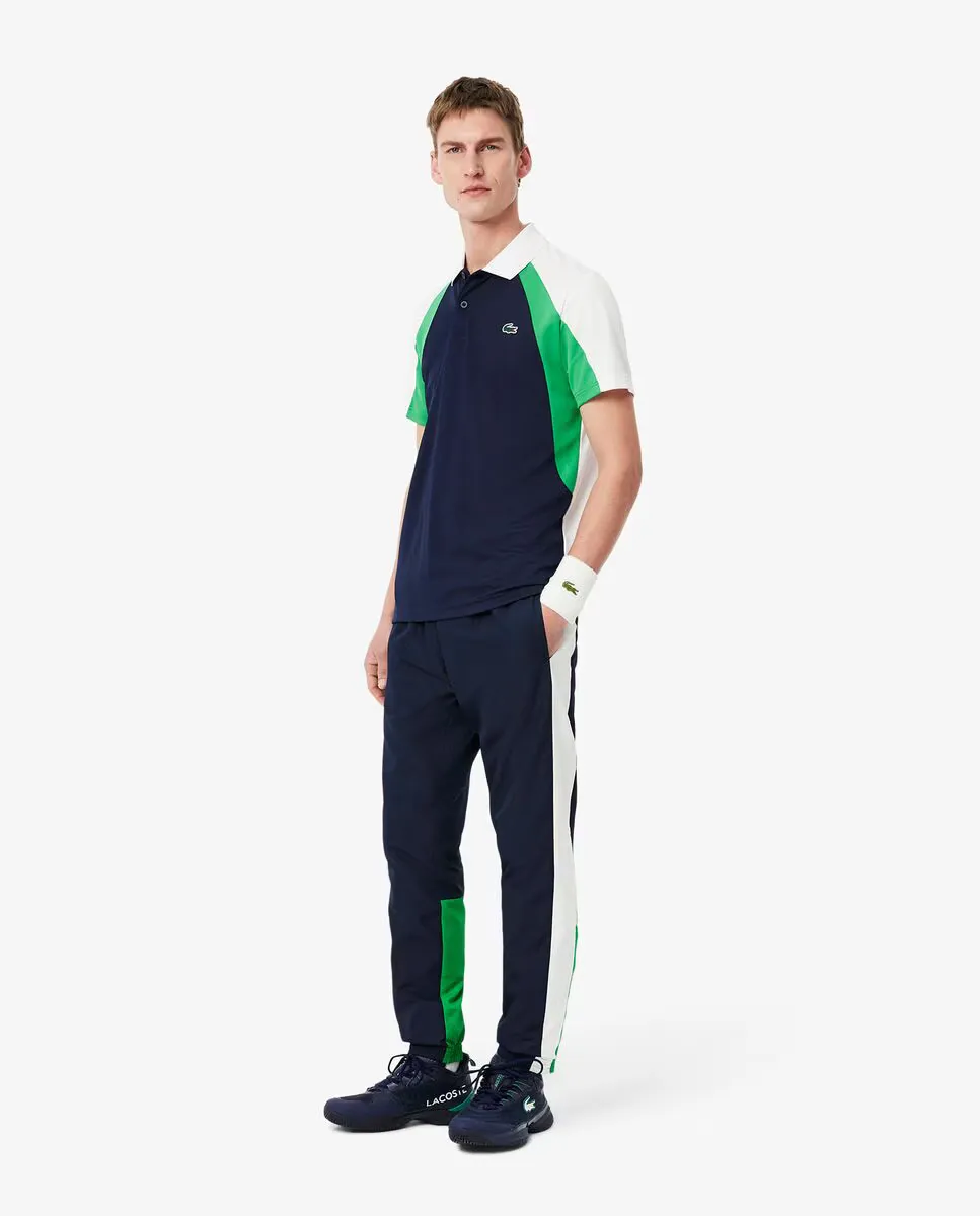 

Мужские спортивные штаны с цветными блоками Lacoste, темно-синий