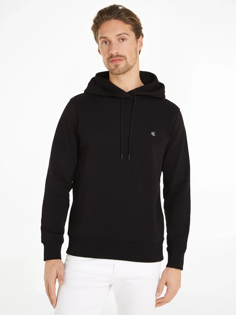 

Толстовка Calvin Klein Jeans "CK EMBRO BADGE HOODIE", с нашивкой-логотипом, цвет Ck Black