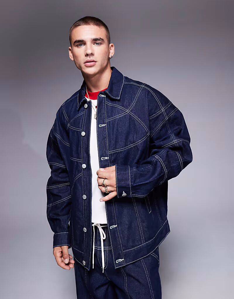 

Джинсовая куртка свободного кроя от ASOS DESIGN цвета индиго с декоративными швами