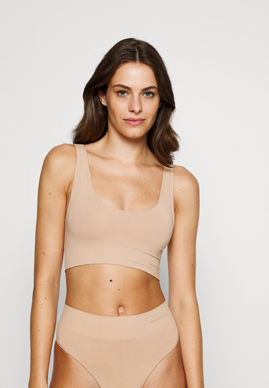 

Верх INVISIBLE BRALETTE SEAMLESS BARE SCOOP Organic Basics, бежевый