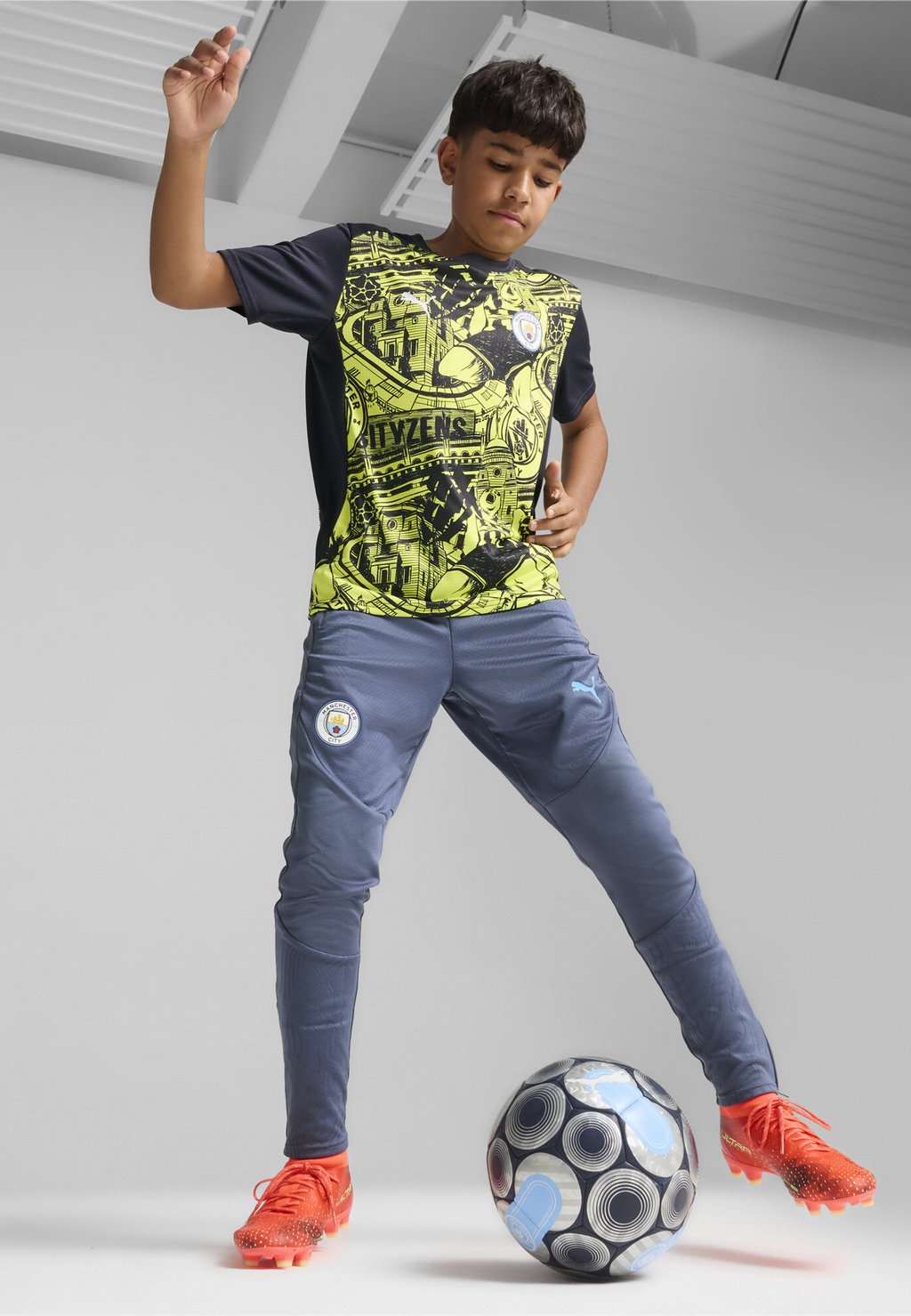 

Спортивная футболка MANCHESTER CITY PREMATCH JR Puma, желтый