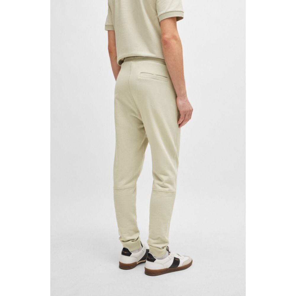 

Спортивные брюки из хлопковой махры с нашивкой-логотипом BOSS, цвет Light Beige