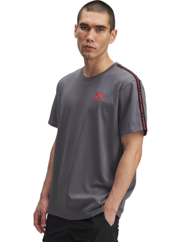 

Спортивная футболка Icon Hwt Taping T-Shirt серого цвета Under Armour