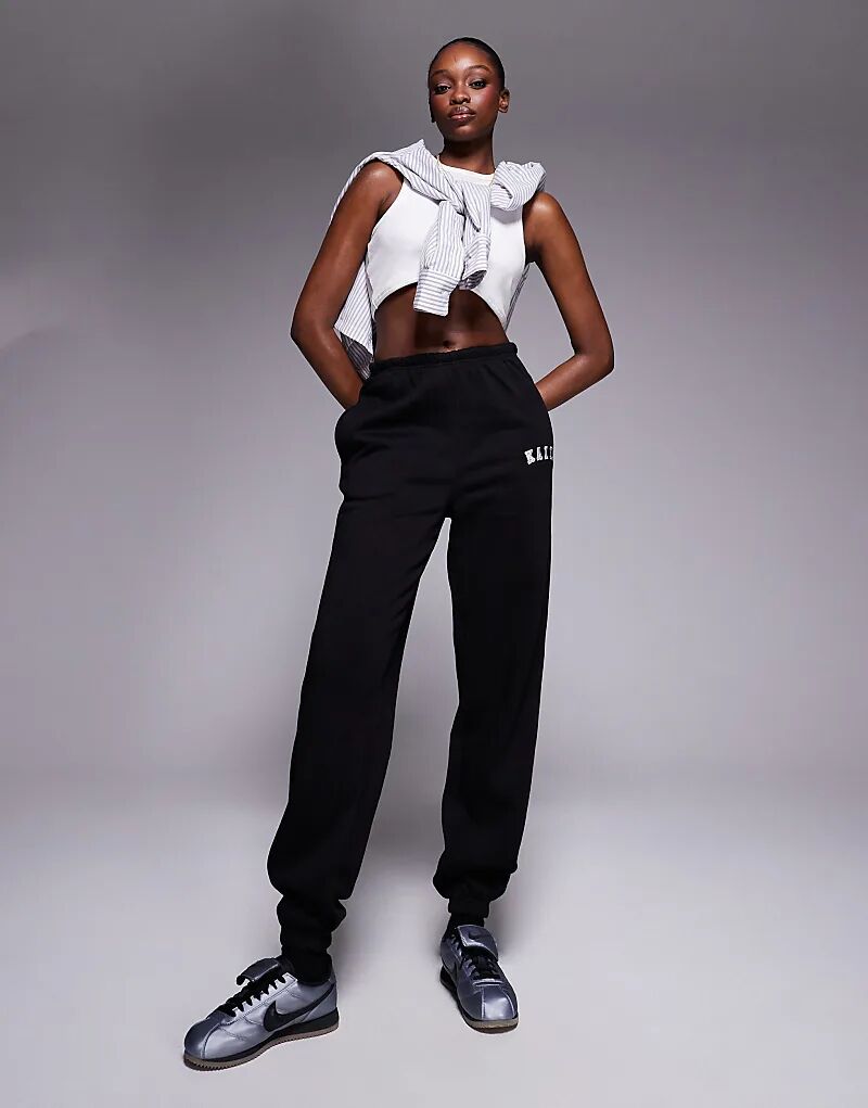 

Черные спортивные брюки Kaiia из хлопковой смеси с вышитым логотипом и манжетами