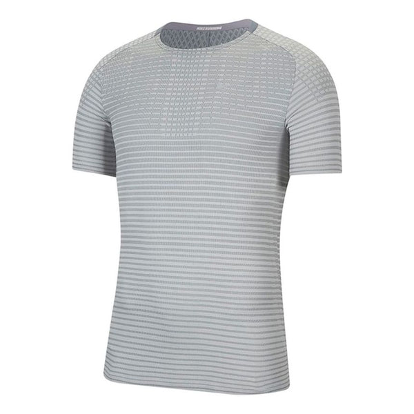 

Футболка techknit ultra casual sports round neck short sleeve light grey Nike, серый