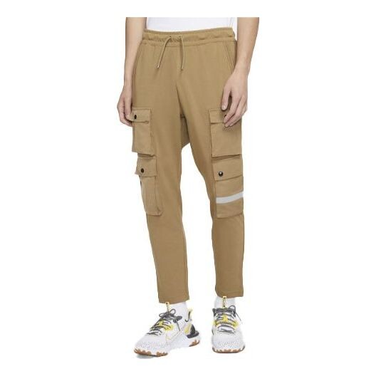 

Брюки sportswear city made multiple pockets reflective logo knit casual pants brown Nike, коричневый