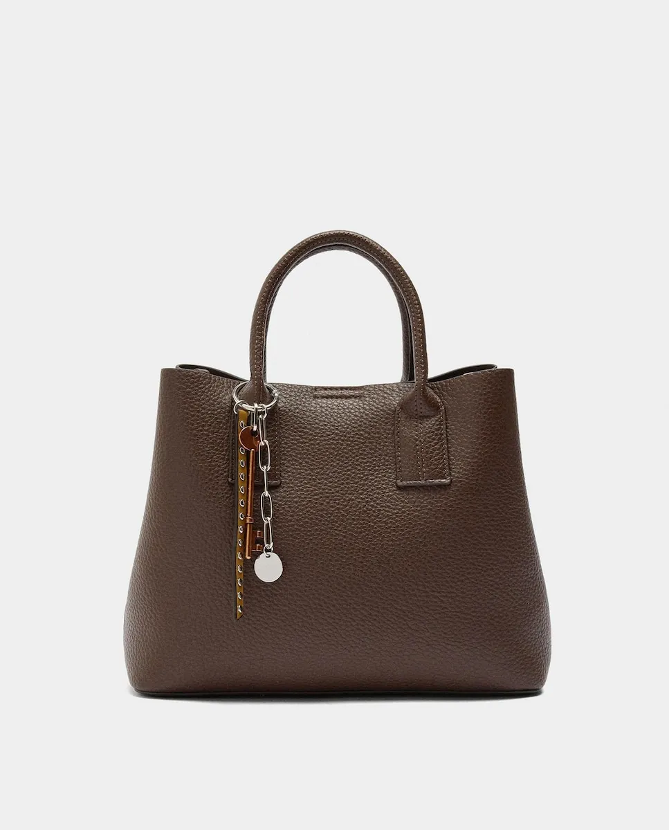 

Трансформируется в сумку через плечо со съемным кольцом для ключей и застежкой-молнией, однотонная Parfois, темно-коричневый