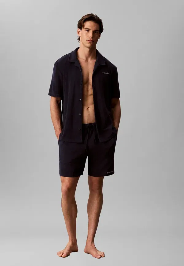 Плавки Calvin Klein Swimwear с длинным шнурком, цвет береговой линии — фото 2