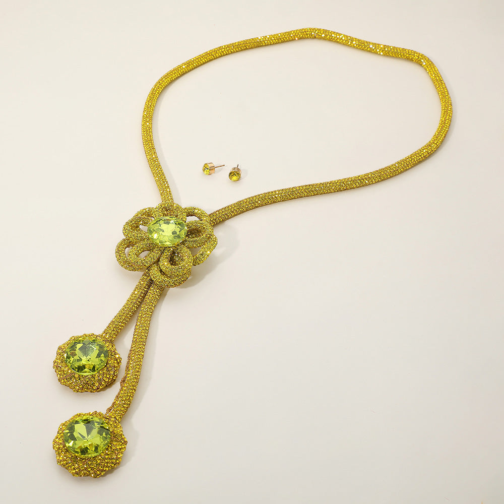

Длинное ожерелье с подвеской в ​​виде цветка с круглыми камнями и заостренными блестками Fashnzfab, желтый