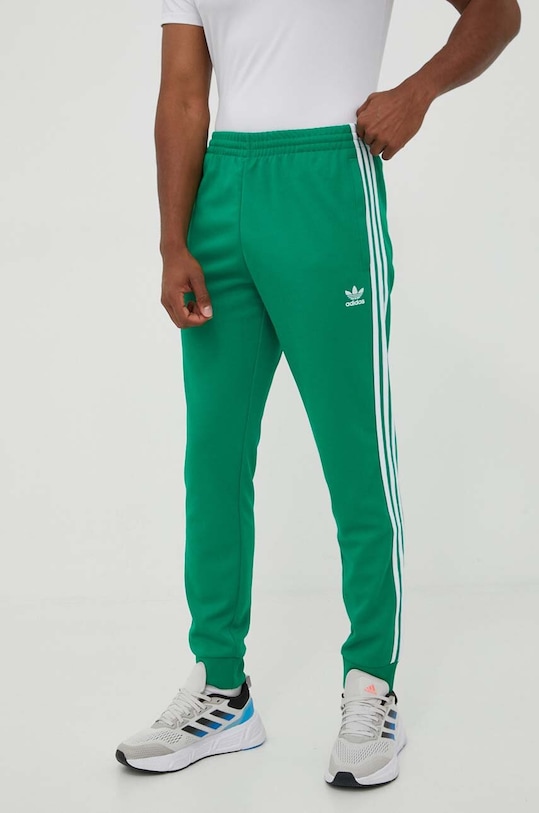 

Брюки спортивные Adicolor Classics SST Adidas Originals, зеленый