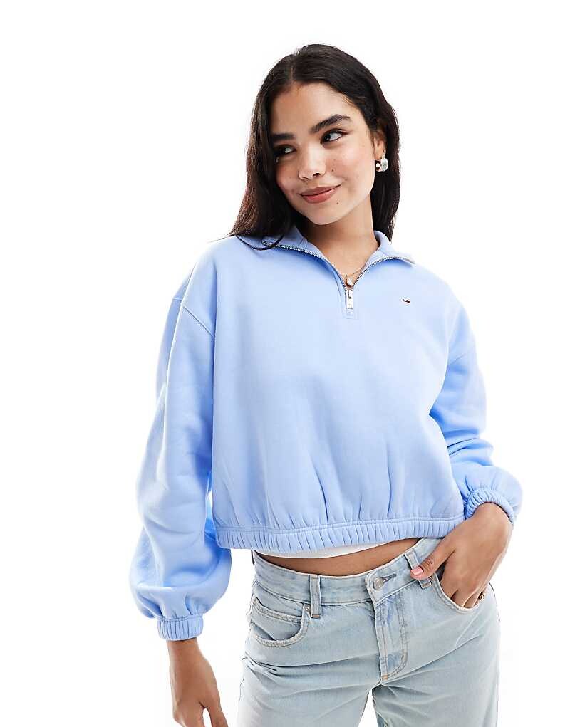 

Tommy Jeans – голубая толстовка свободного кроя с молнией на шее