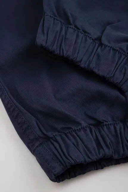Брюки детские из хлопка slim fit Coccodrillo, синий — фото 4