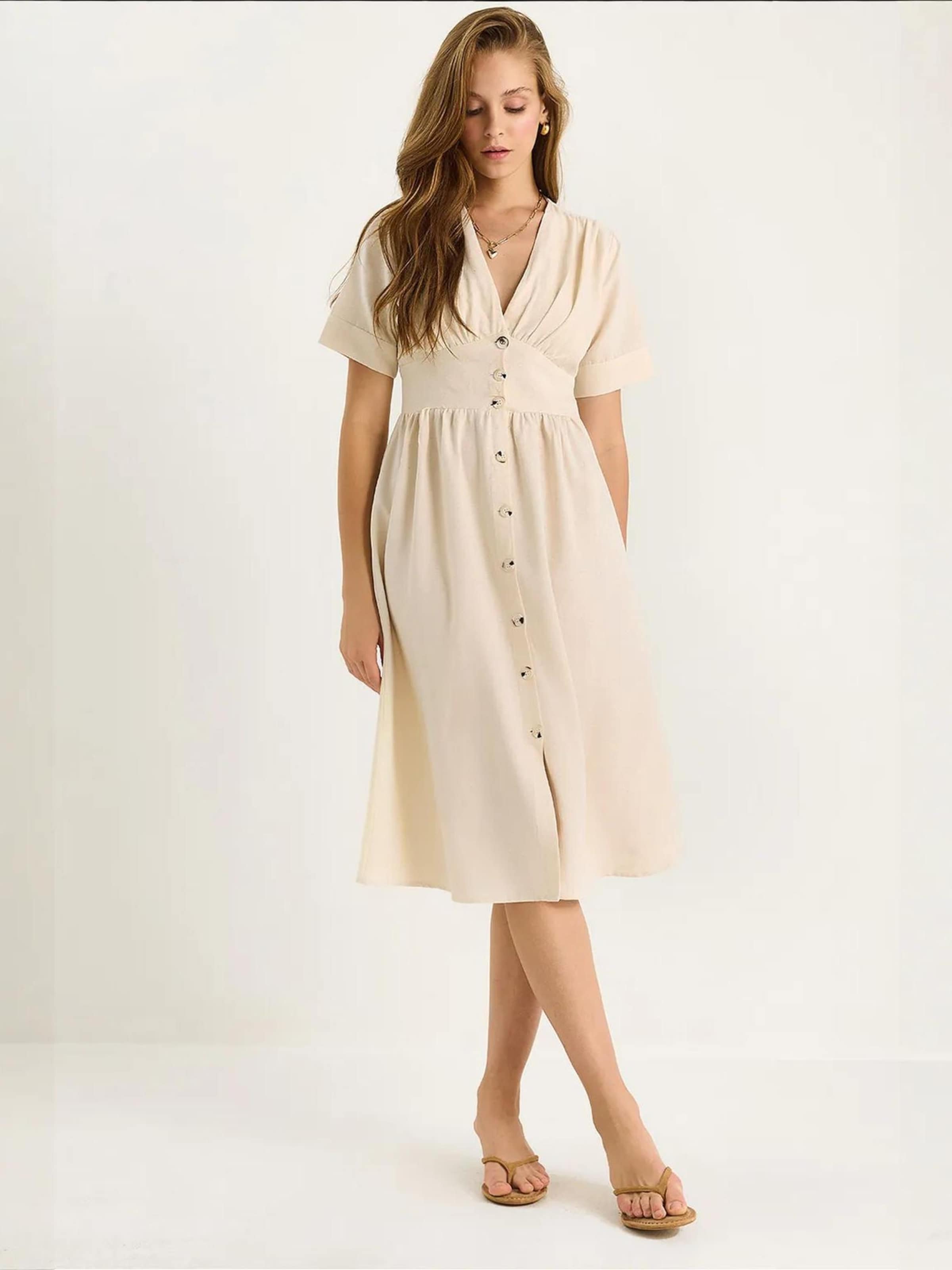 

Bianco Lucci Платье-рубашка в бежевом цвете