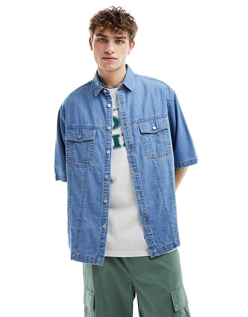 

Голубая джинсовая рубашка оверсайз с короткими рукавами ASOS DESIGN