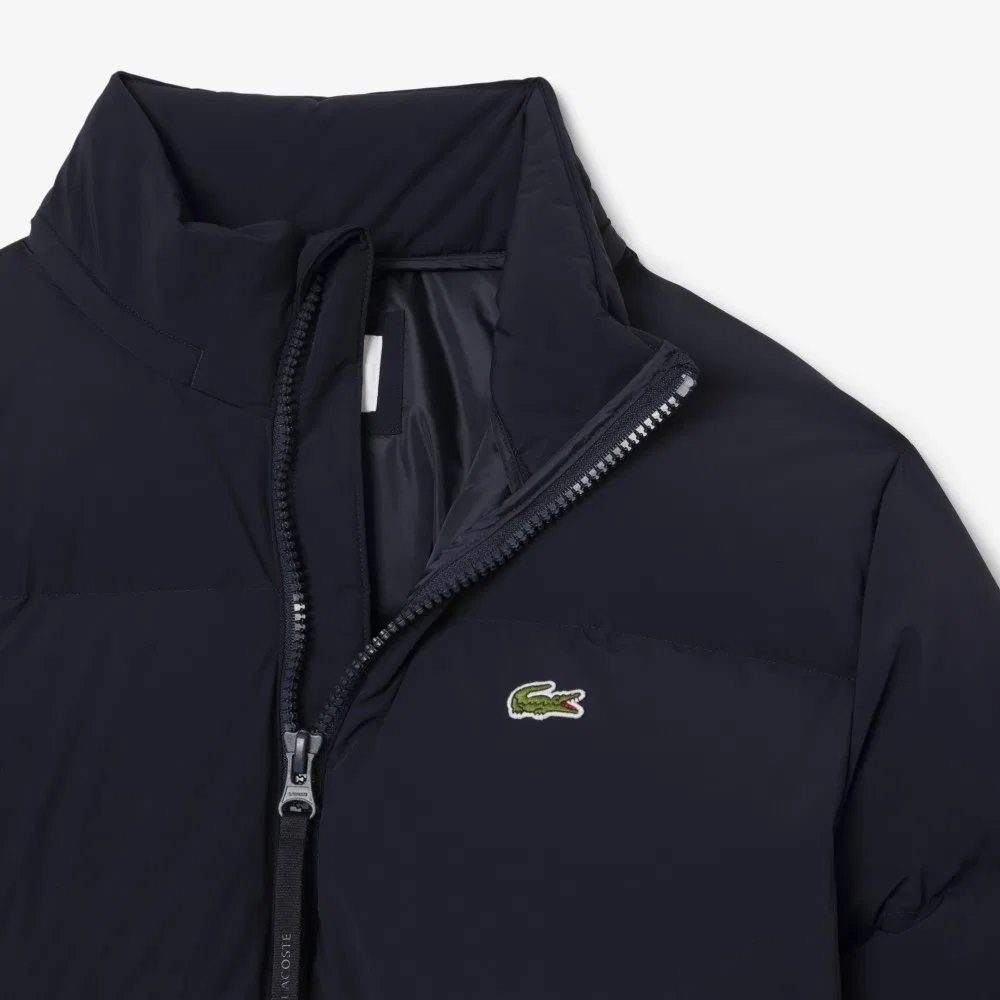 Мужской тёмно-синий пуховик с высоким воротником от Lacoste — фото 3