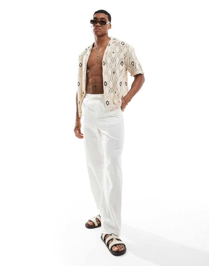 

Белые свободные льняные брюки с эластичной резинкой на талии ASOS DESIGN