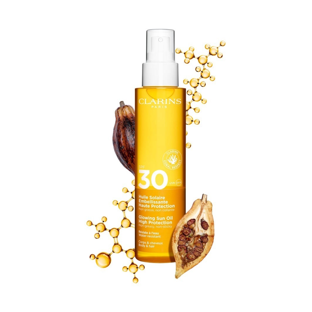Солнцезащитный спрей sun care huile solaire embellissante haute protection spf 30 Clarins, объем 150 мл — фото 2