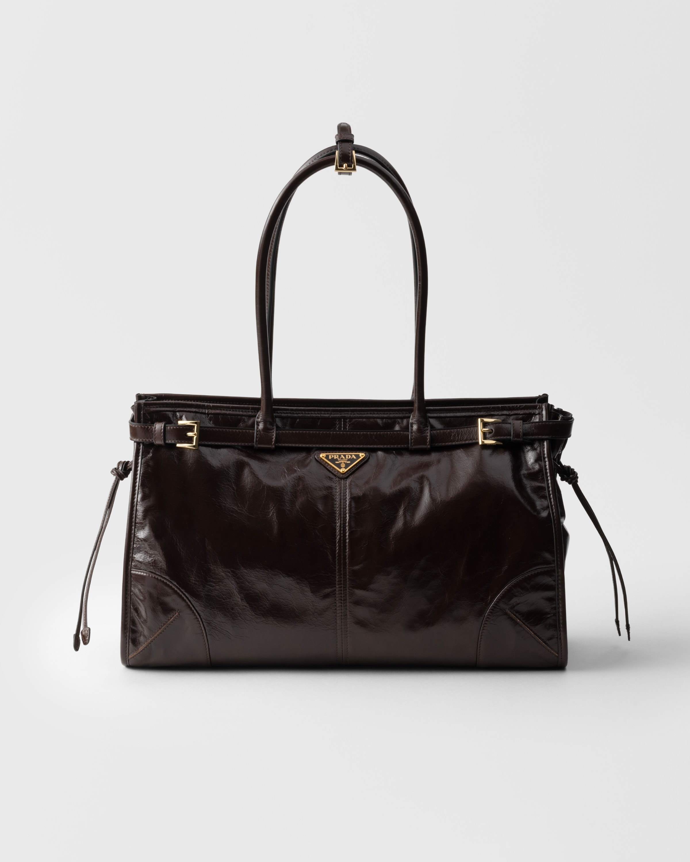 

Большая кожаная сумка Prada Bonnie Prada, темно-коричневый