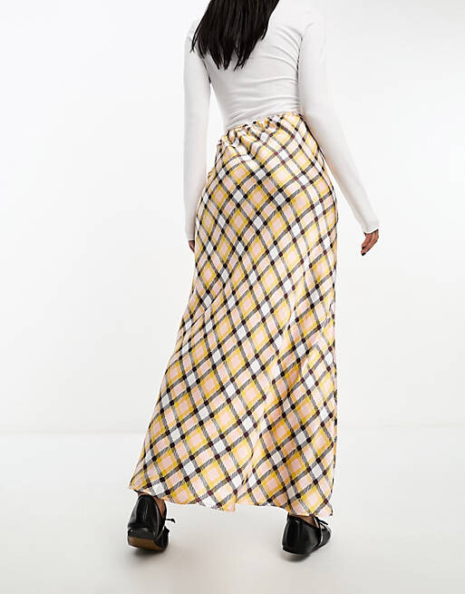 

Атласная юбка макси в розово-желтую клетку ASOS DESIGN