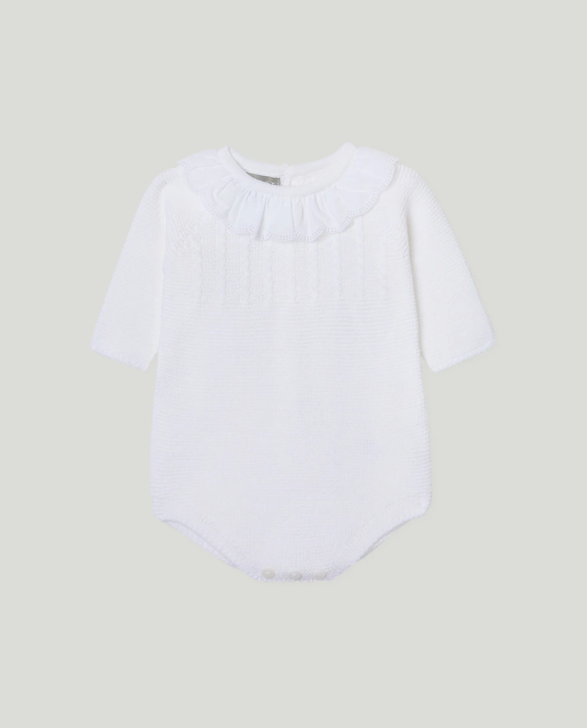 

Детский полукомбинезон с длинными рукавами, классическим воротником-стойкой и узором "восьмёрки" на кокетке Coconut El Corte Inglés, белый