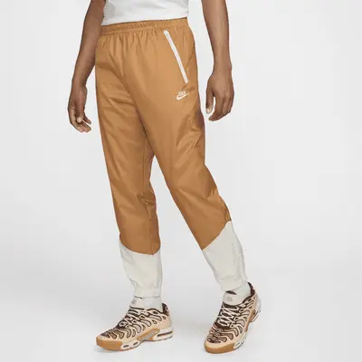 

Брюки Nike Windrunner, цвет Flax/Sail/Sail