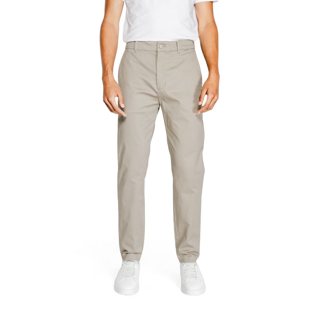 

Бежевые хлопковые джинсы и брюки Rigenerato Calvin Klein