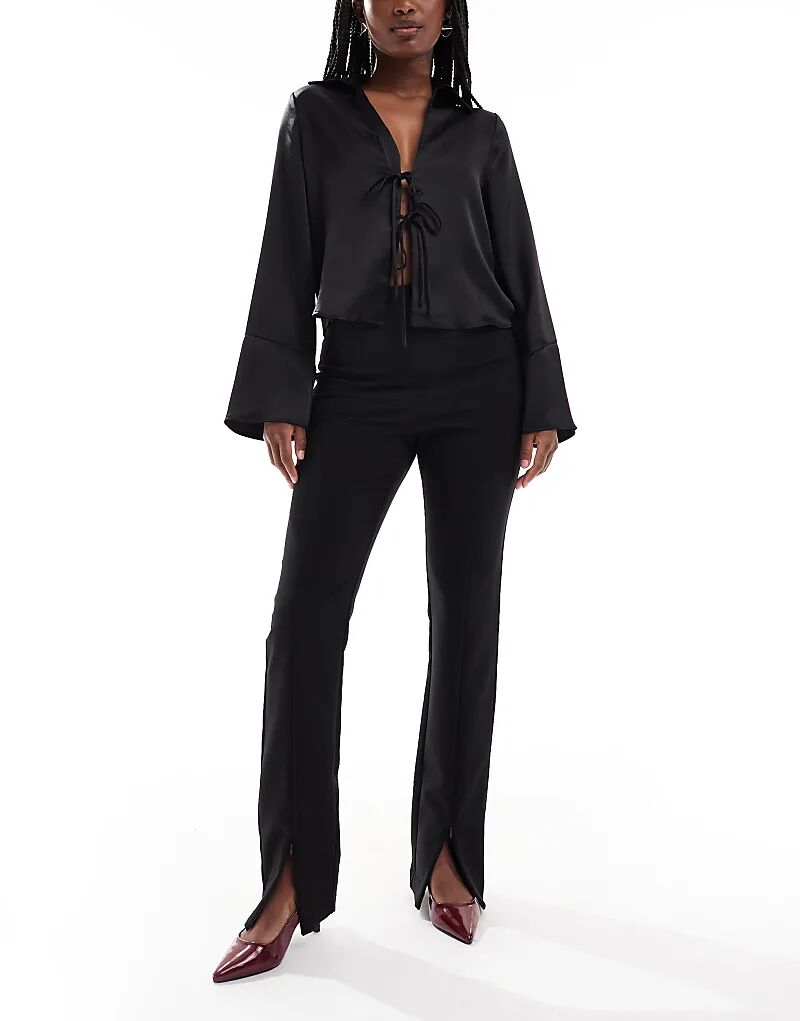 

Узкие брюки ASOS DESIGN с молнией спереди черного цвета