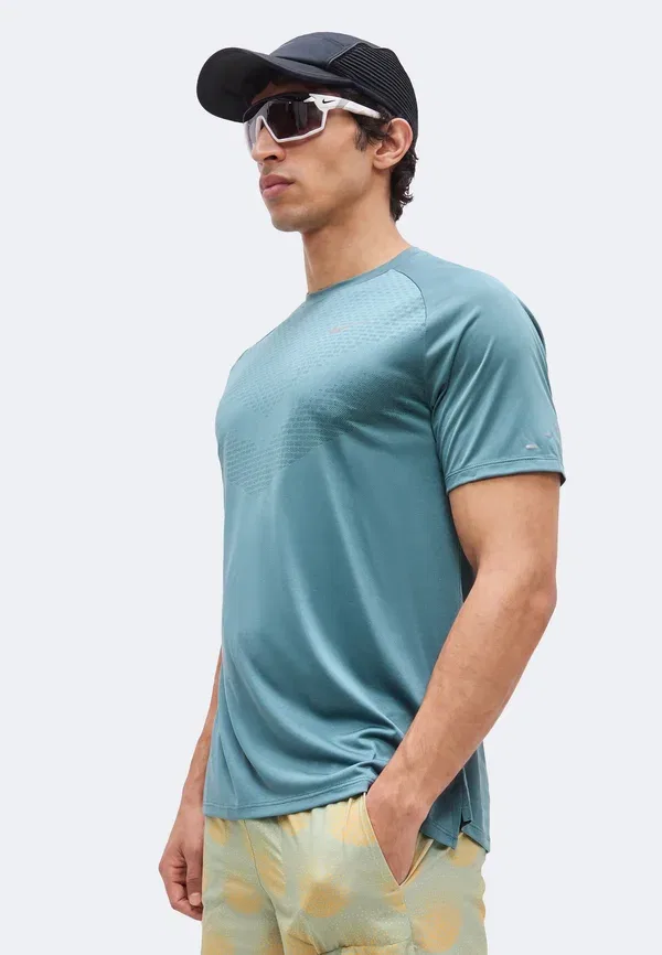 Спортивные шорты Nike Performance, нефритовый/горизонт — фото 4