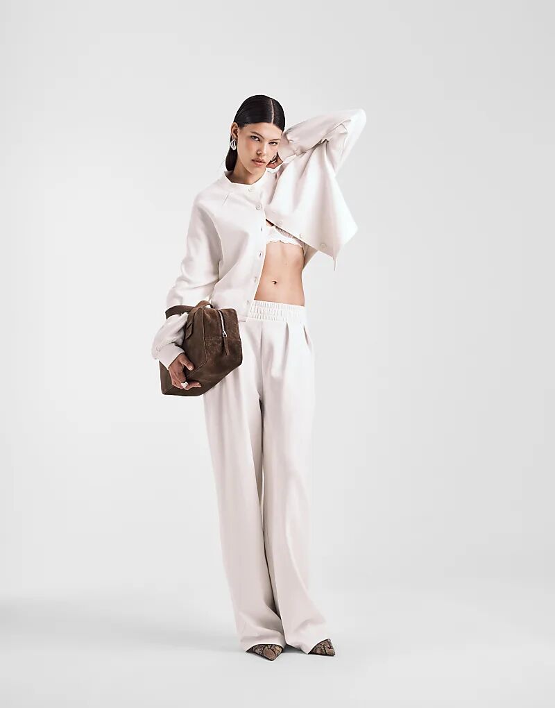 

Брюки интерлок ASOS DESIGN очень широкого кроя кремового цвета