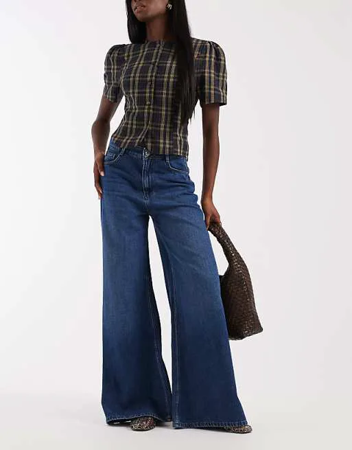 

Мягкие широкие джинсы с высокой посадкой River Island из темного денима