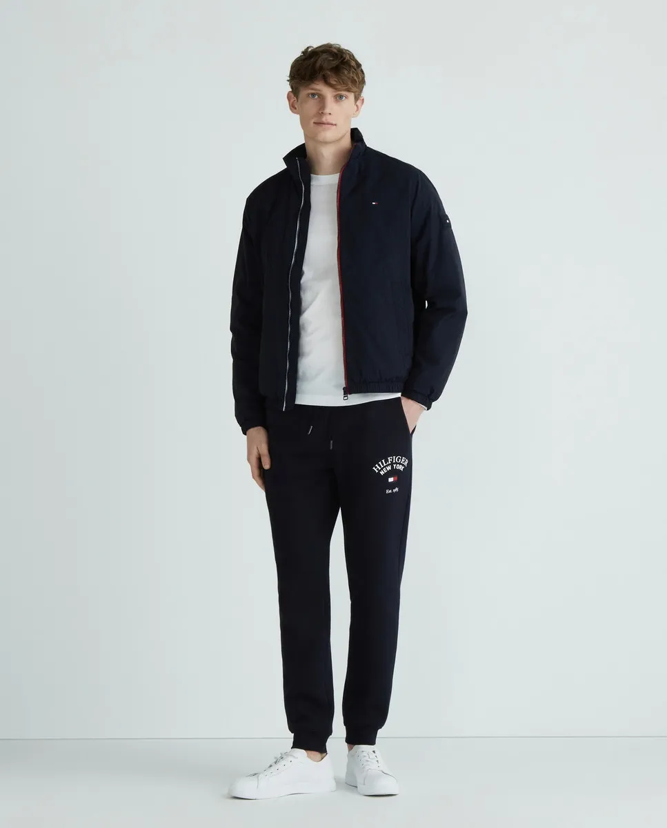 

Длинные спортивные брюки с дугообразным брендингом Tommy Hilfiger, тёмно-синий