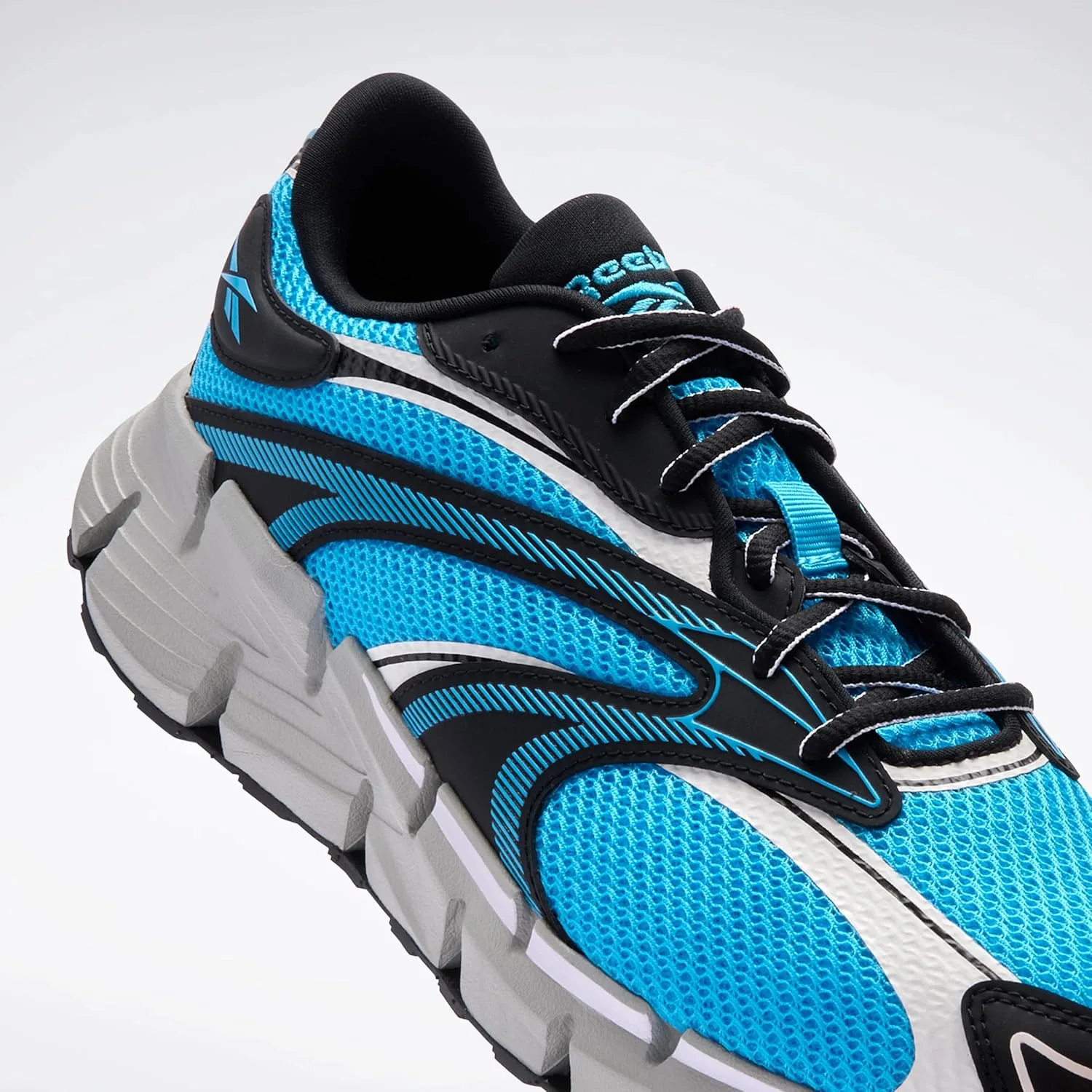 Кроссовки Reebok Zig Hypnotica унисекс, черный/голубой/серый — фото 2