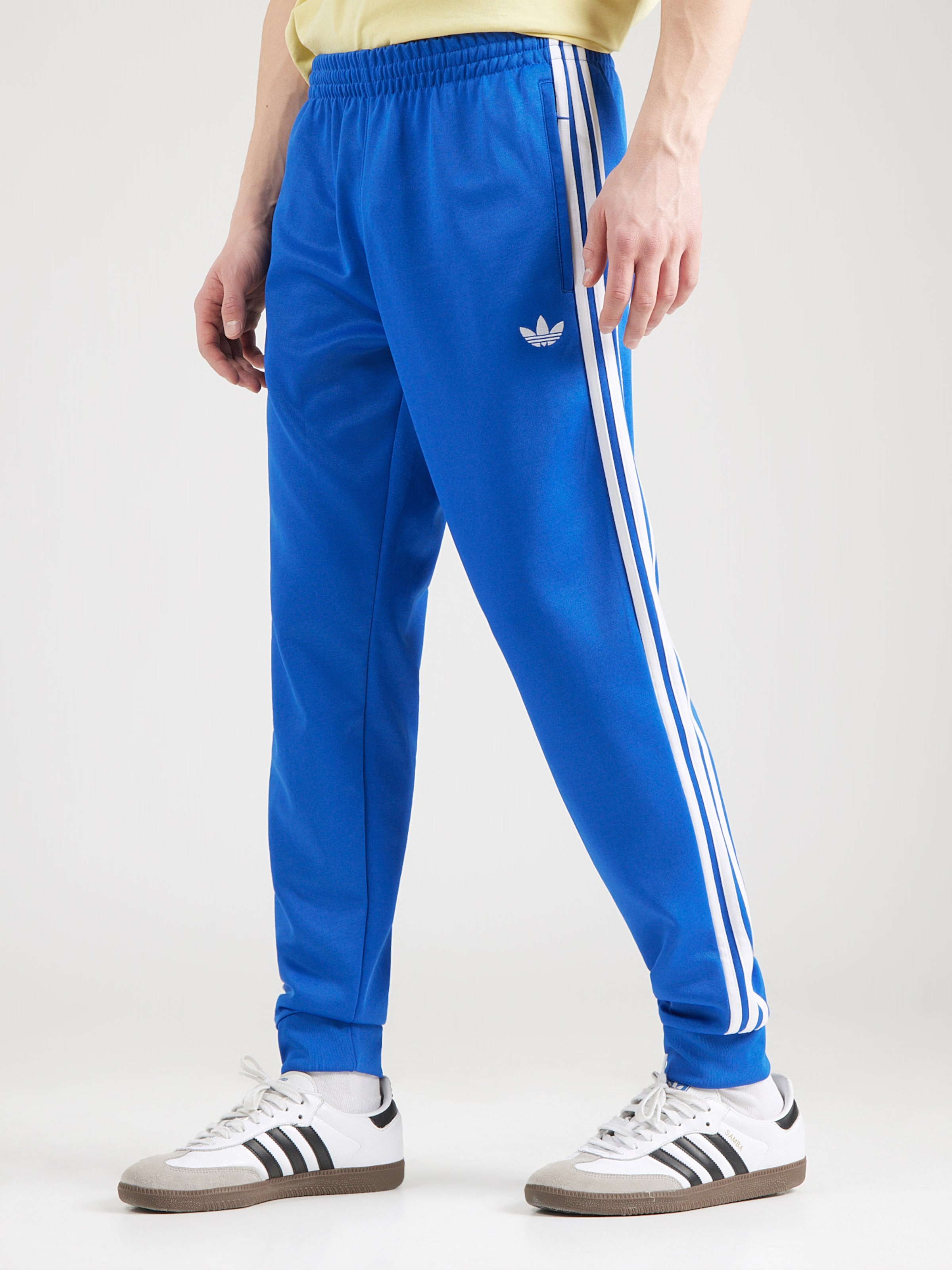 Adidas Originals Брюки с зауженным низом в синем цвете — фото 2