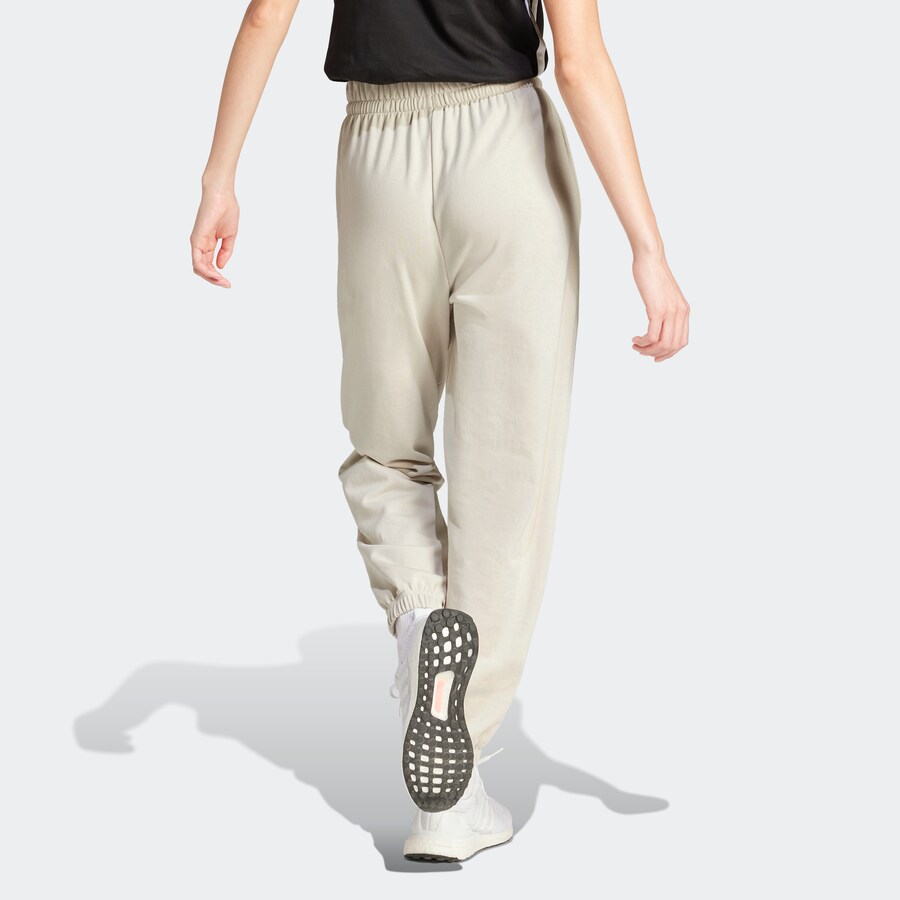 Зауженные тренировочные брюки ADIDAS SPORTSWEAR Essentials, кремовый — фото 3