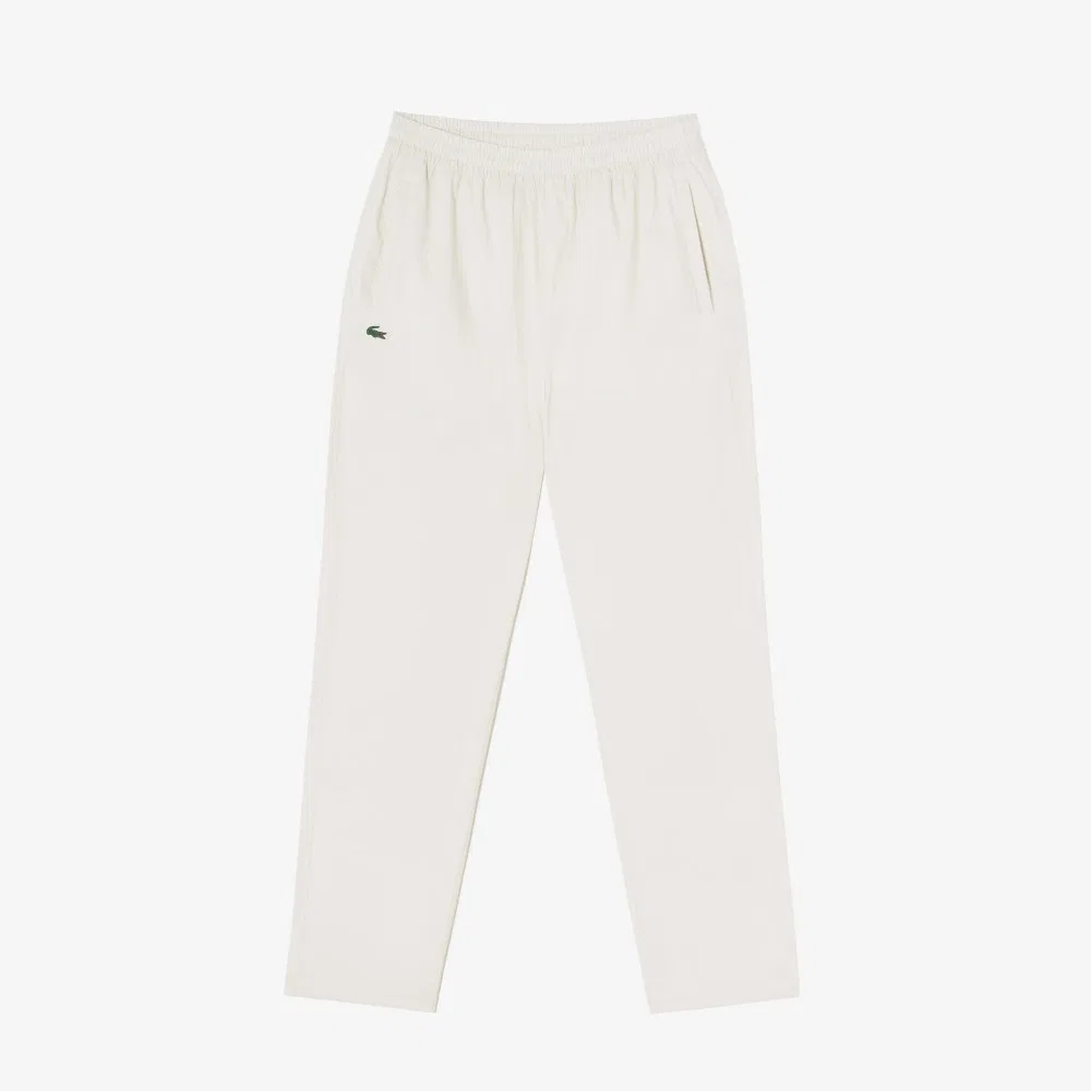 Брюки женские Lacoste зауженные, эластичный материал, айвори