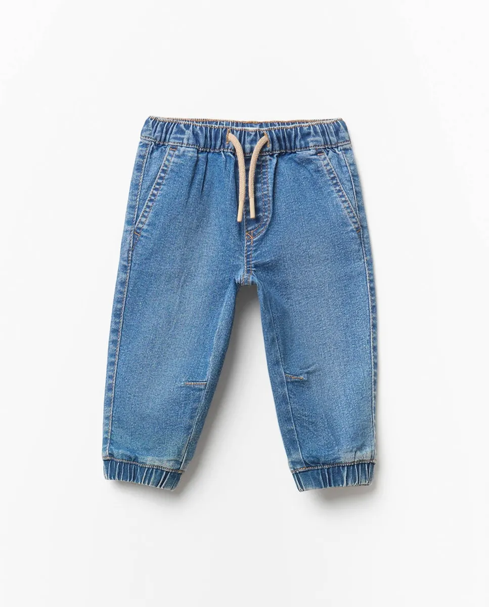 

Джоггеры из джинсового трикотажа Sfera, светло-голубой