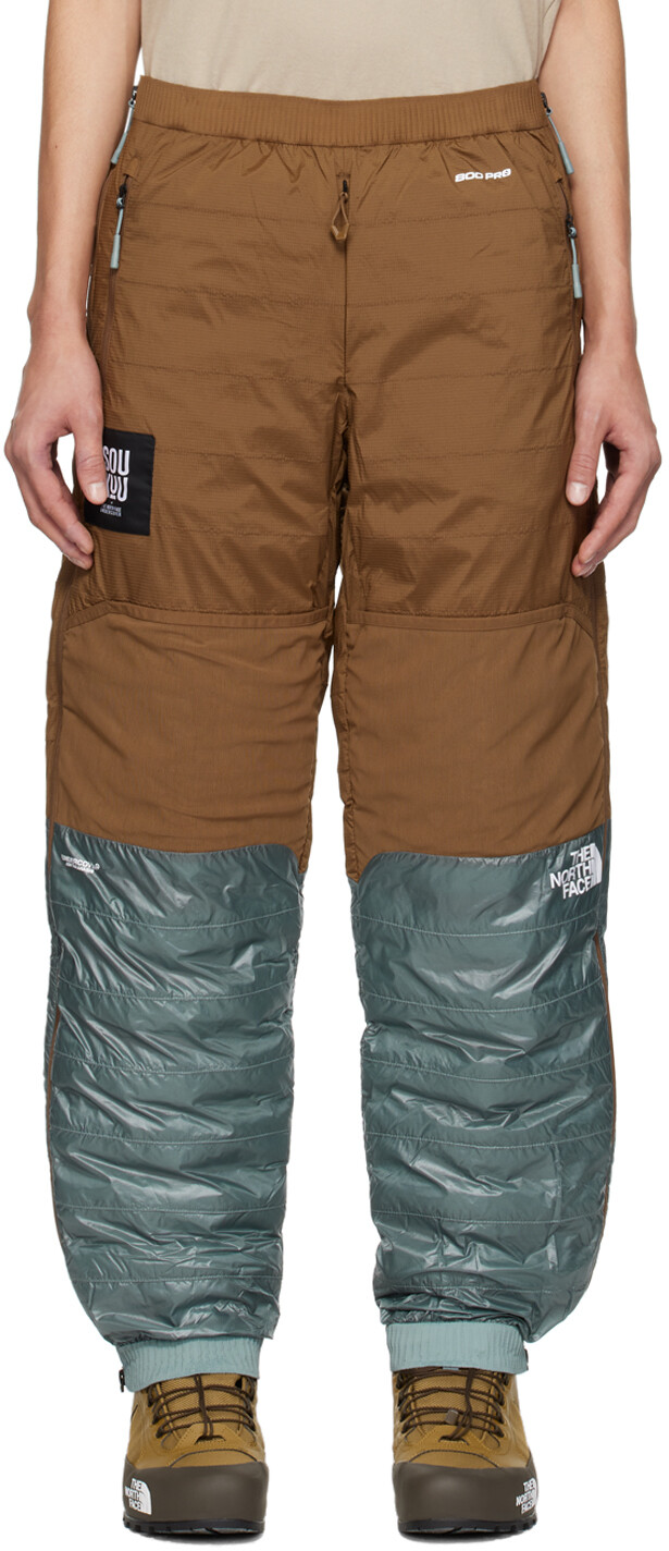 

Коричневые и синие брюки The North Face Edition Down UNDERCOVER