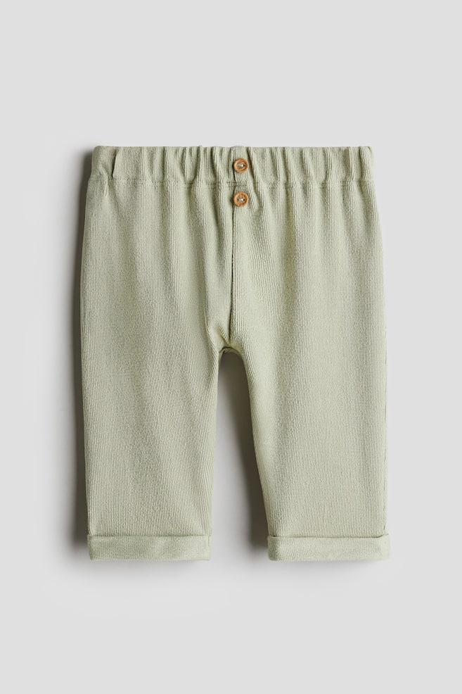 

Брюки с декоративными пуговицами H&M, зеленый