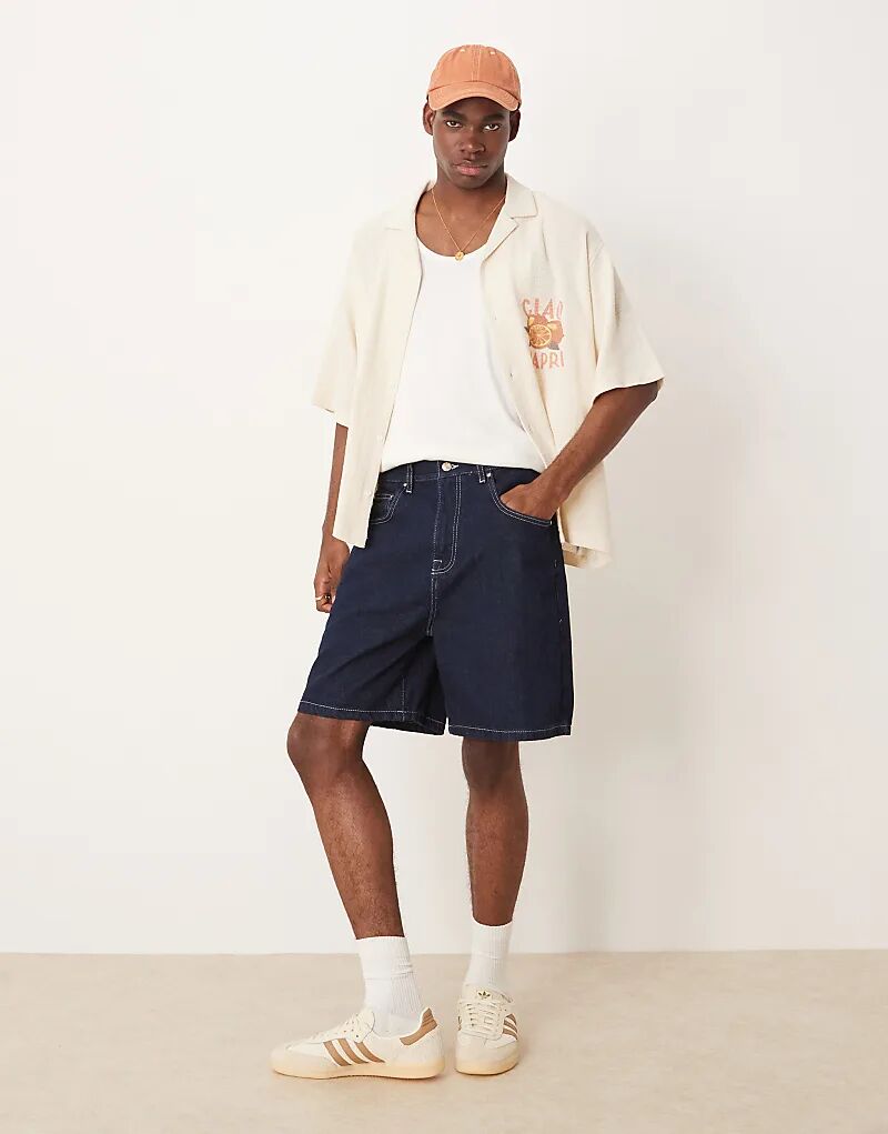 

Джинсовые шорты стандартной длины ASOS DESIGN цвета индиго