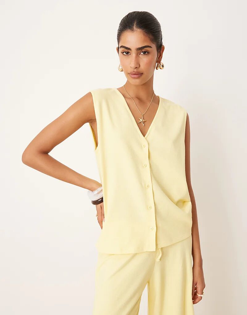 

Жилет свободного кроя ASOS DESIGN из текстурированной трикотажной ткани цвета пахты