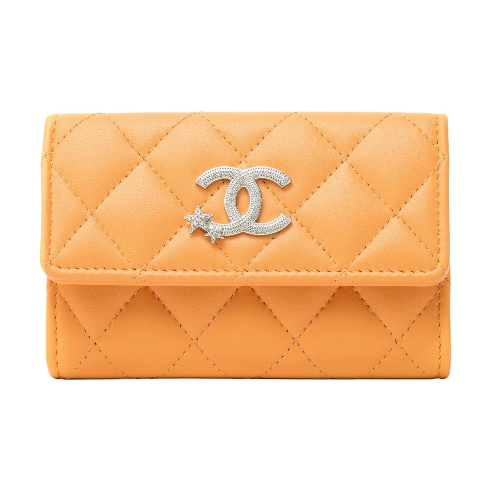 

CHANEL Женский клатч из овчины оранжевый